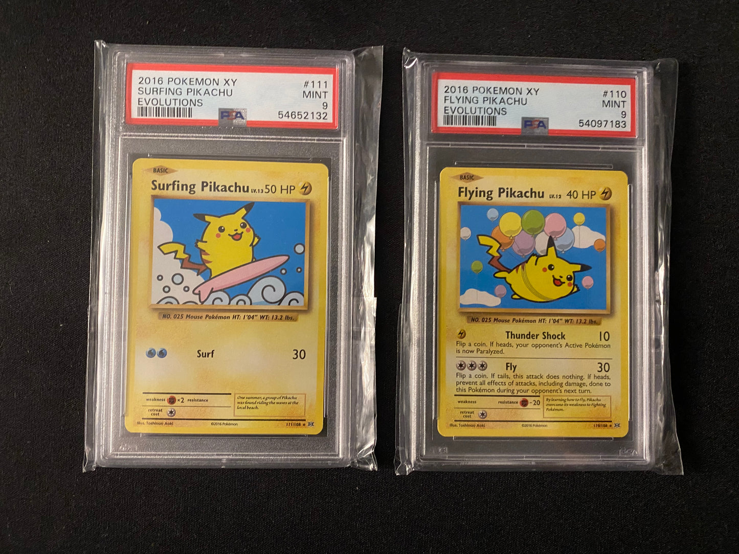 Surfing Pikachu 111/108 & Flying Pikachu 110/108 - Evolutions - PSA 9 - Set